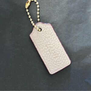 Coach hang tag
